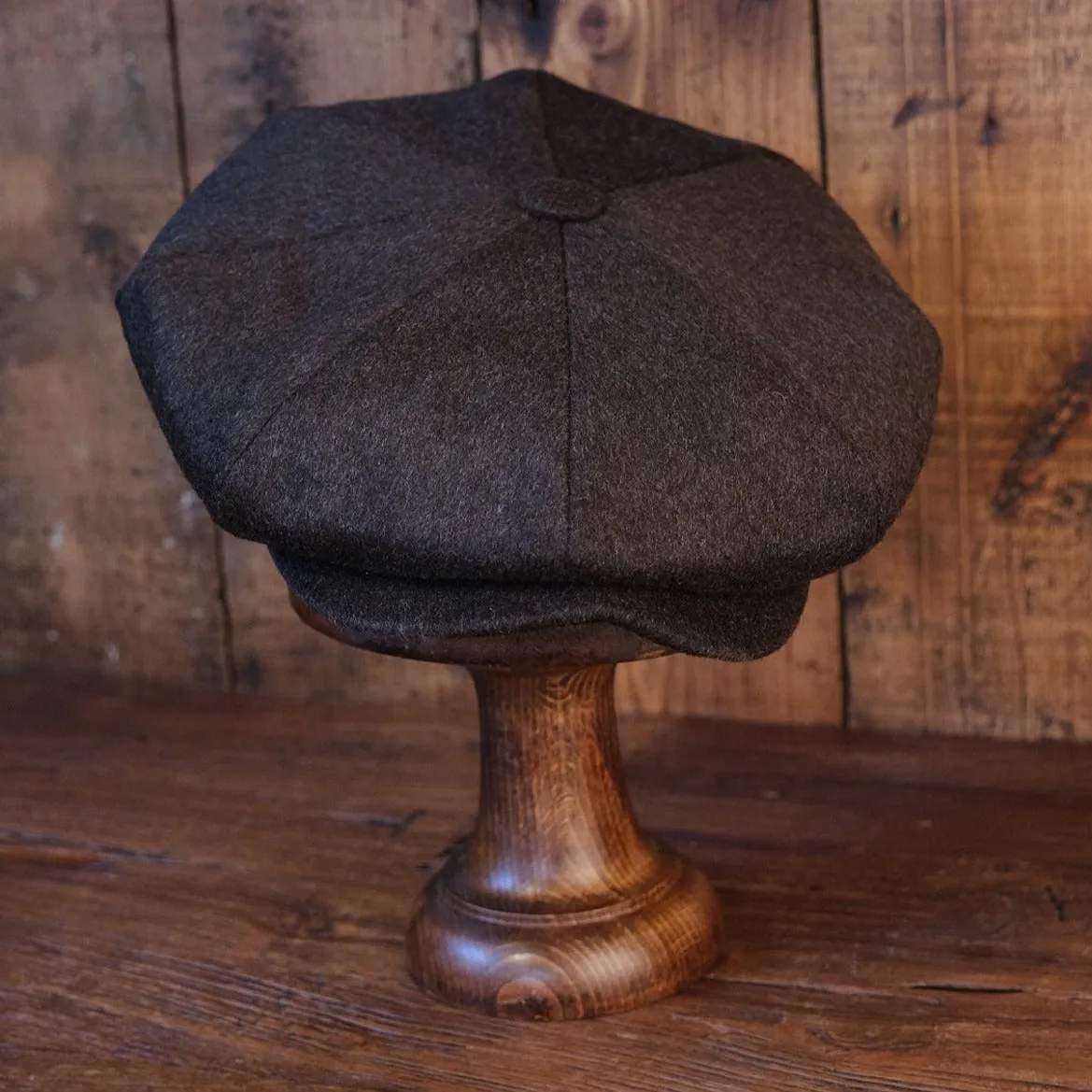 Eight Piece Faded Brown Wool Newsboy Cap