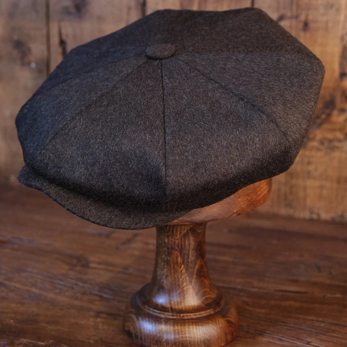 Eight Piece Faded Brown Wool Newsboy Cap