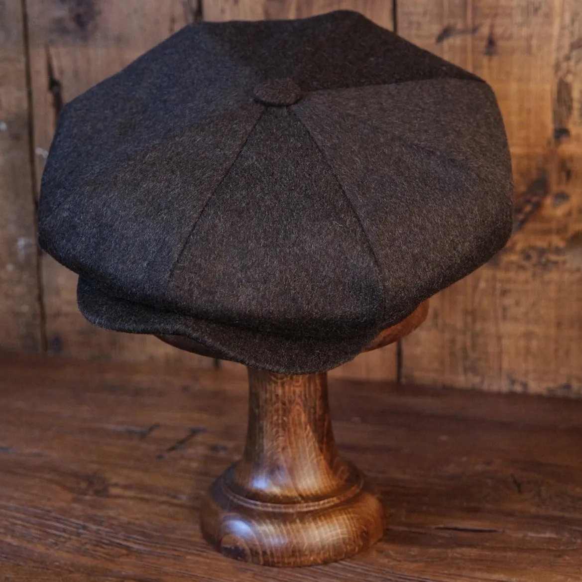 Eight Piece Faded Brown Wool Newsboy Cap