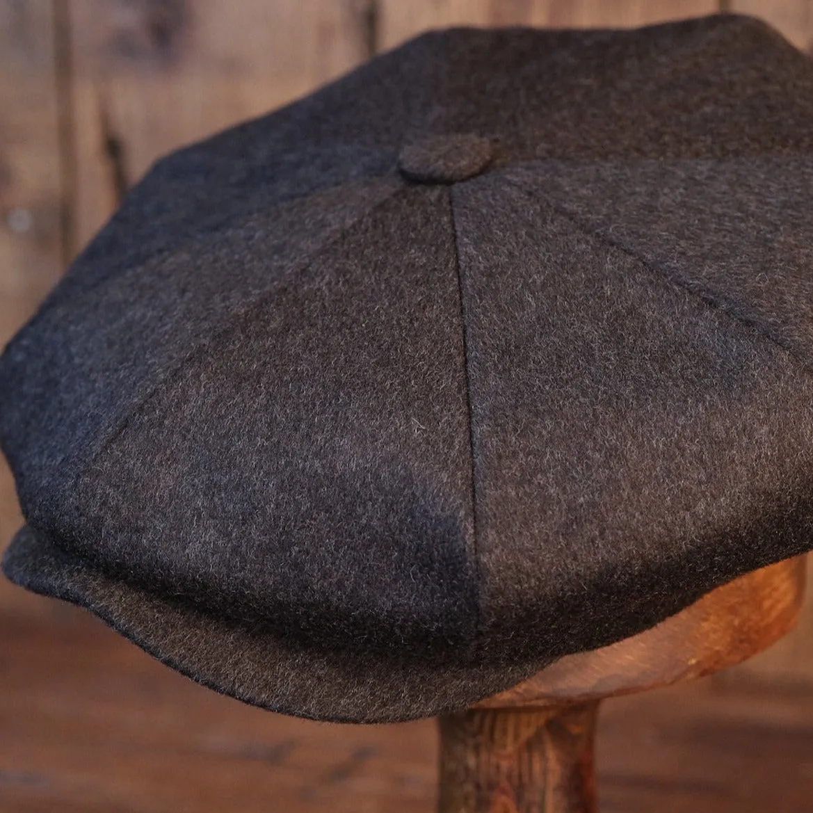 Eight Piece Faded Brown Wool Newsboy Cap